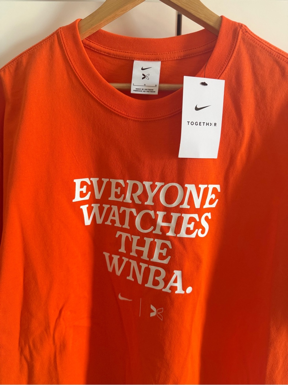 Nike Orange Graphic Crewneck Tee with White Text